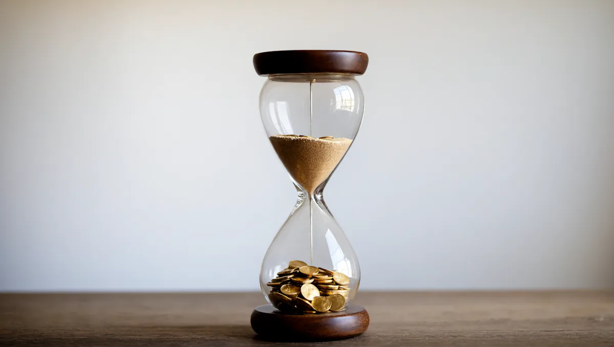 Hourglass with coins on a wooden desk, representing retirement withdrawal sustainability